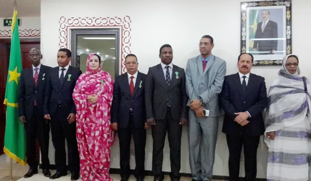 صورة جماعية لبعض الموشحين مع وزير الخارجية والوزيرة المنتدبة لدى وز?