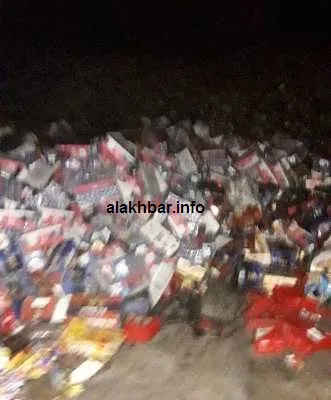 جانب من المواد المنتهية الصلاحية والتي تم احراقها مساء الثلثاء في ال