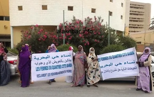 ناشدت النسوة المحتجات رئيس اللجنة الوطنية لحقوق الإنسان في أن يستمع 