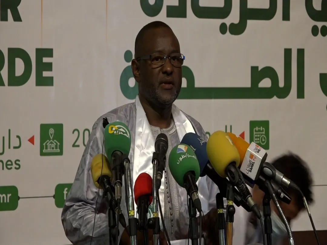 رئيس المنظمة المنتهية ولايته عالي كاسوكي خلال كلمته